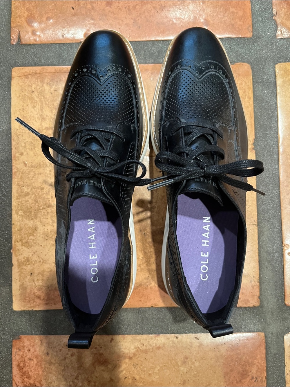 Cole Haan Women’s Black Leather Perforated Wingtip Oxfords never worn.